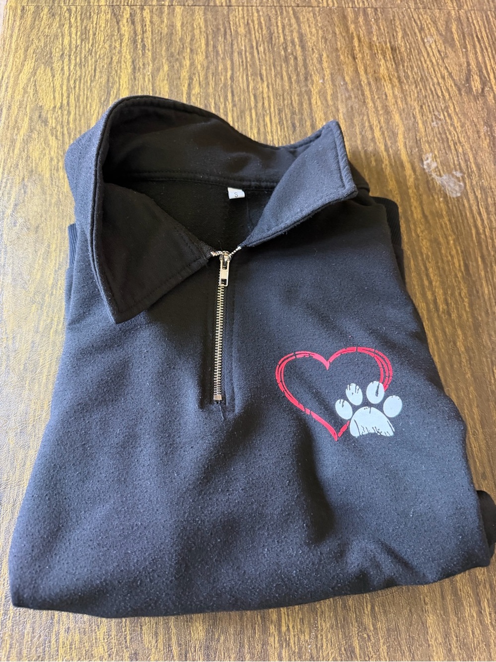 Black Quarter-Zip Sweatshirt with Red Heart Paw Graphic